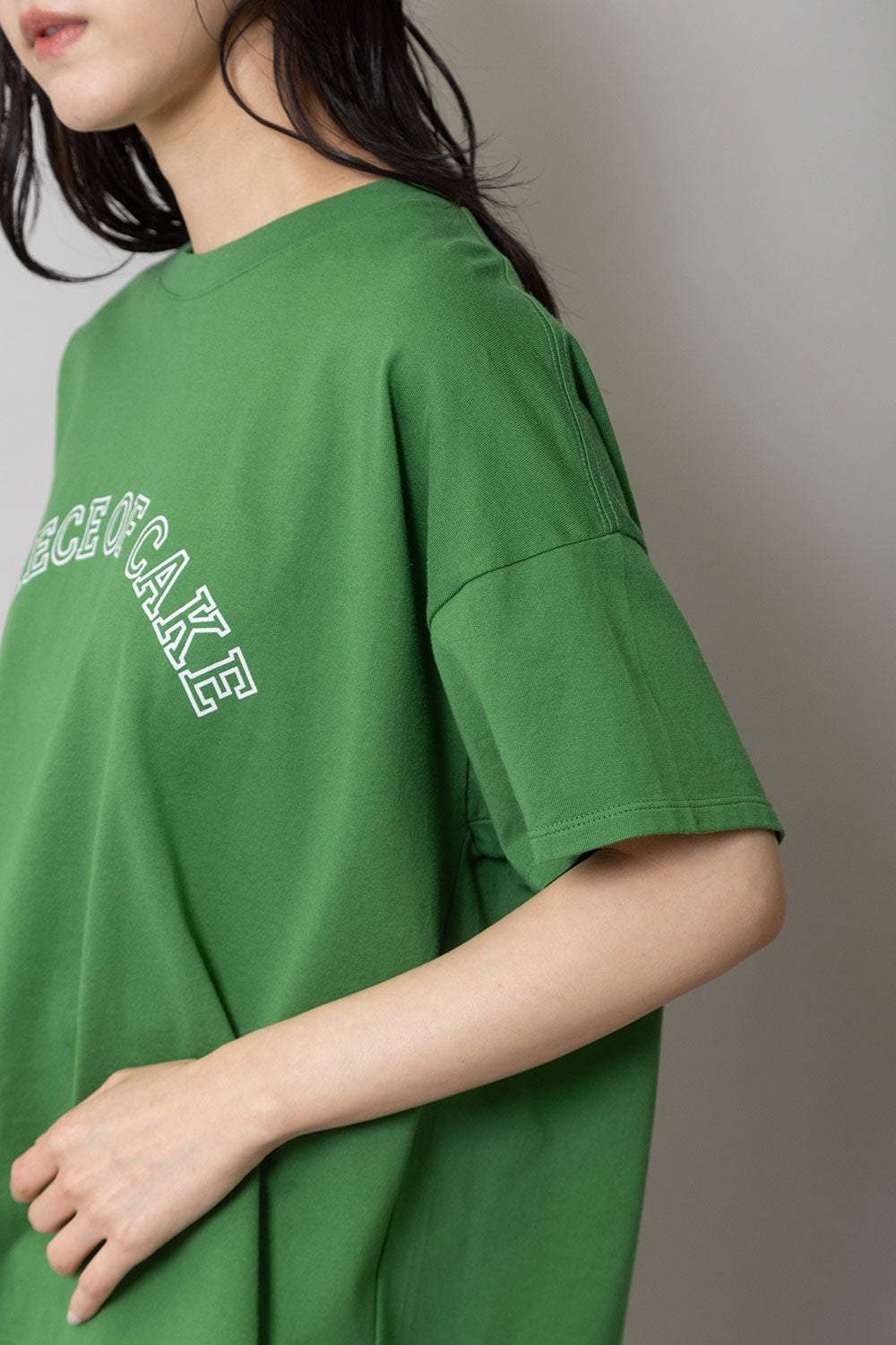 Munich ”A PIECE OF CAKE”ロゴプリントTシャツ【MN261U33】
